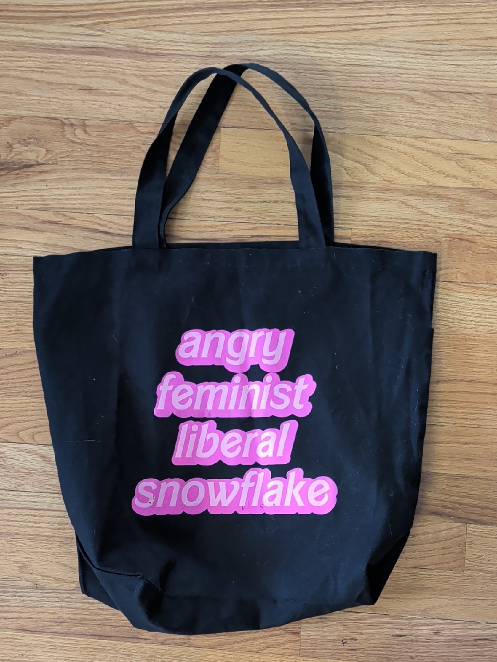 Black Tote Bag with Pink Slogan - Feminist Snowflake Design